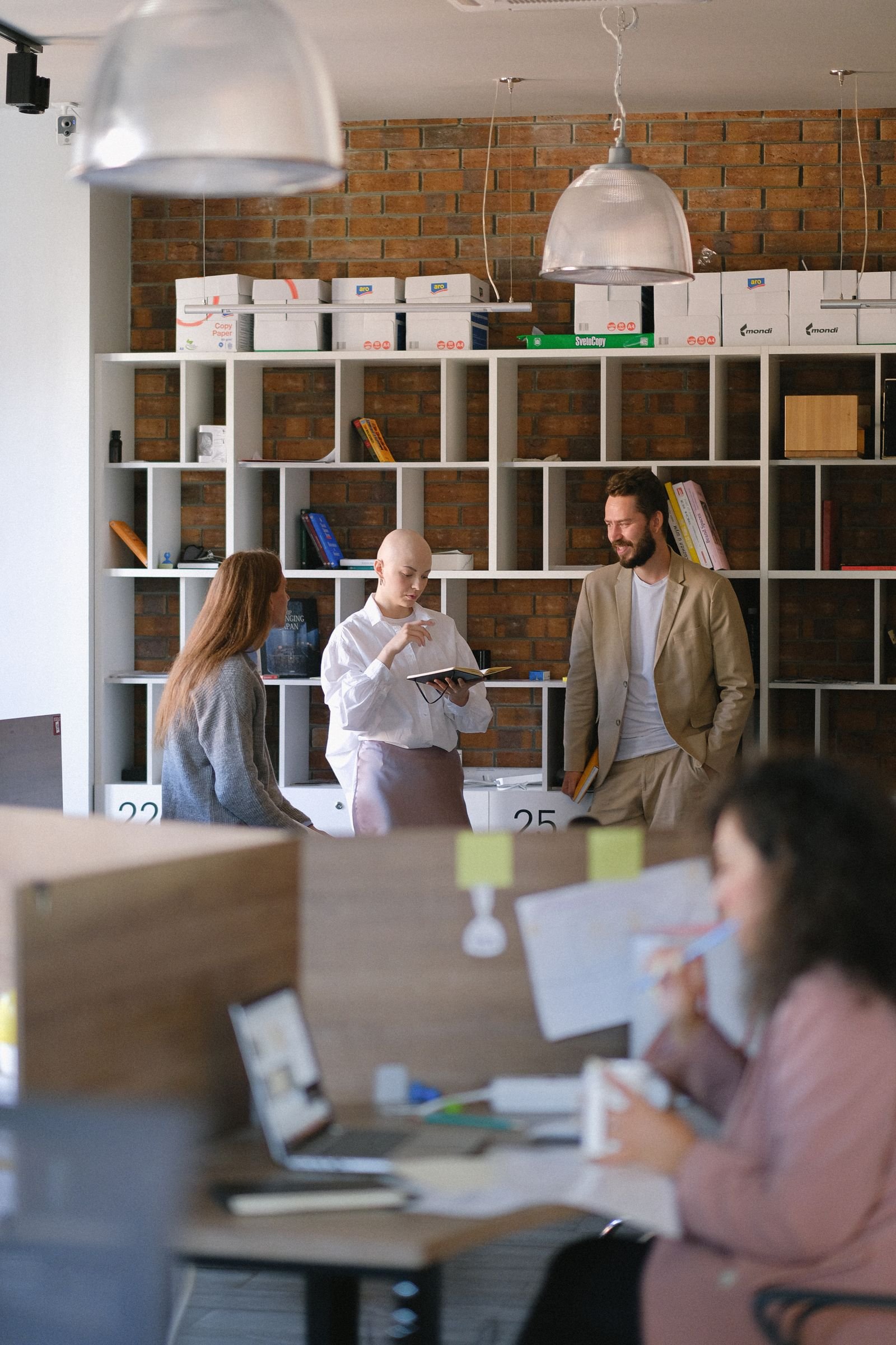 A team discussing a growth plan in a modern workplace